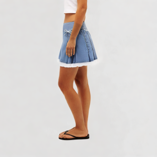 Skirt with lace decoration and bow