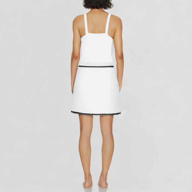 Elegant women's two-piece knitted cropped top and skirt